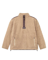 A beige-colored half zip fleece pullover with two front zipper pockets and a ' Nikben ' patch on the chest.