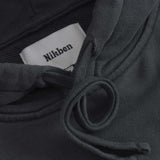 Close up of drawstrings on black cropped hoodie