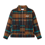 A lumberjack jacket with a checkered pattern in brown, blue, and black colors, featuring two front pockets and a YKK zipper.