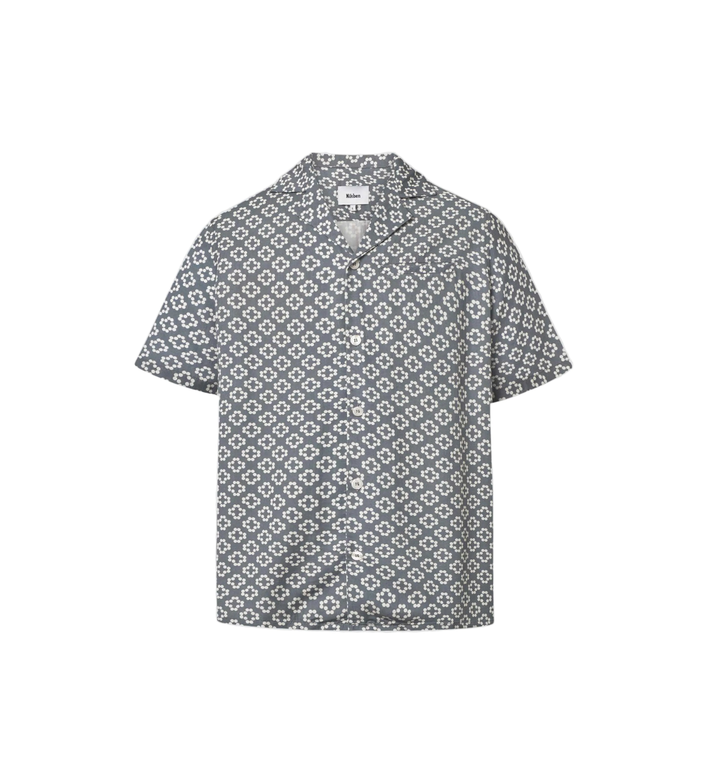 A short-sleeved steel blue shirt with a multicolor geometric pattern, an open collar, and button closure at the front.