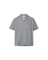 A short-sleeved steel blue shirt with a multicolor geometric pattern, an open collar, and button closure at the front.