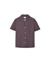 A short-sleeved brown shirt with a multicolor geometric pattern, an open collar, and button closures at the front.