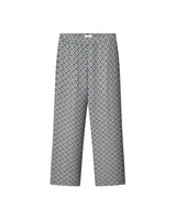 A pair of steel blue geometric patterned pants with a relaxed fit and side pockets.