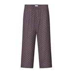 A pair of brown multicolor geometric pattern pants with side pockets.