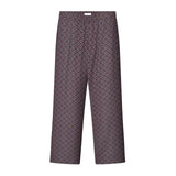 A pair of brown multicolor geometric pattern pants with side pockets.