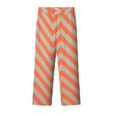 A pair of orange striped pants with a relaxed fit made from Tencel material.