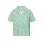A short-sleeved green shirt with a camp collar and mother-of-pearl buttons, displayed against a plain background.