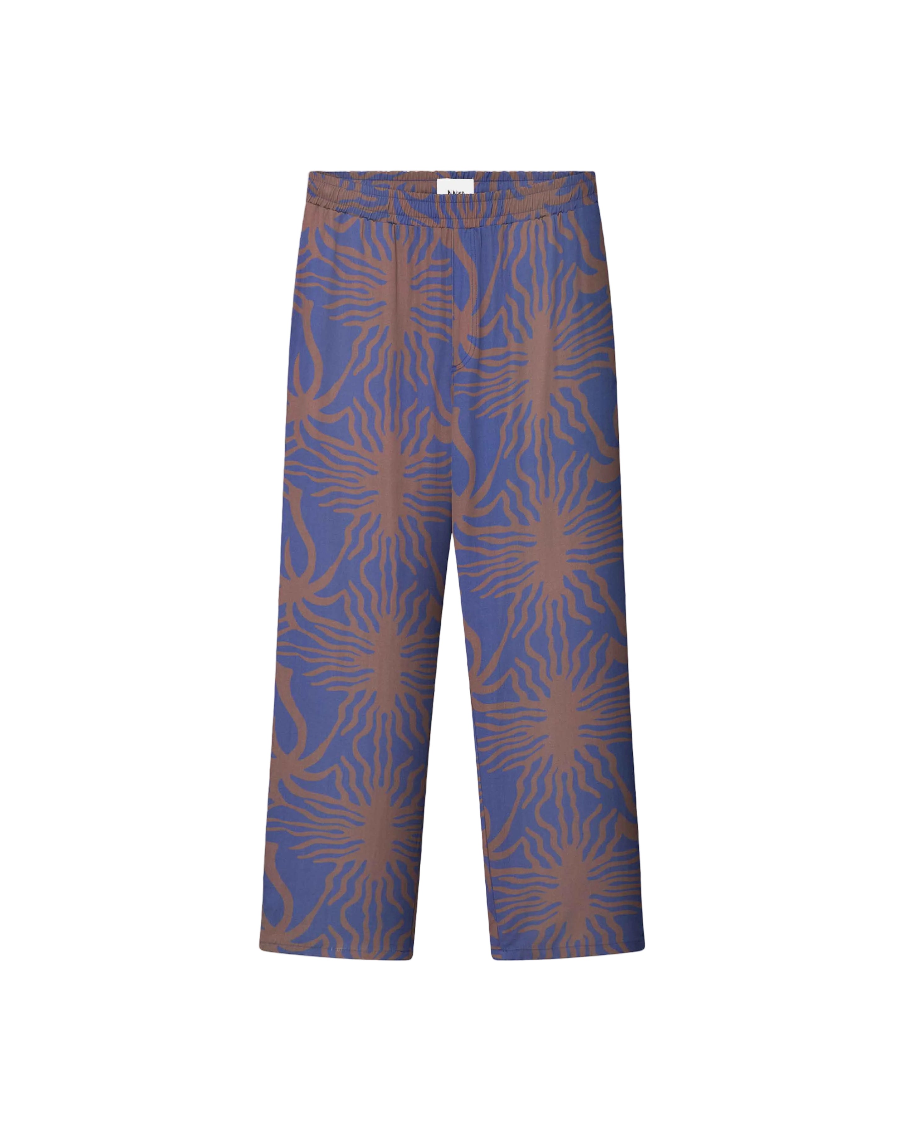 A pair of purple pants with a multicolor graphic pattern, featuring a relaxed fit and side pockets.