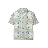 Vintage pale yellow short sleeved shirt with paisley pattern
