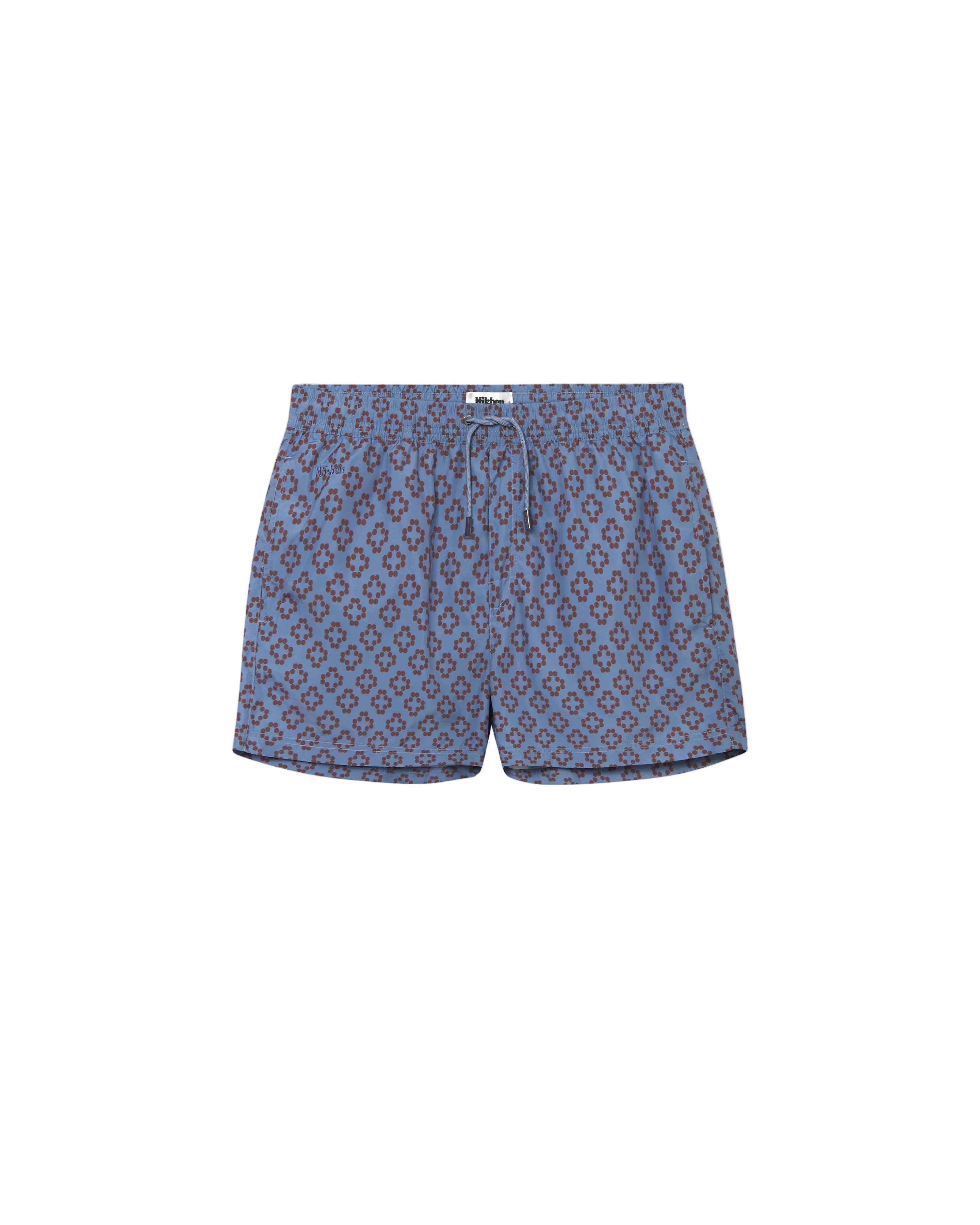 A pair of blue swim trunks with a geometric pattern, featuring side pockets and a drawstring waist.