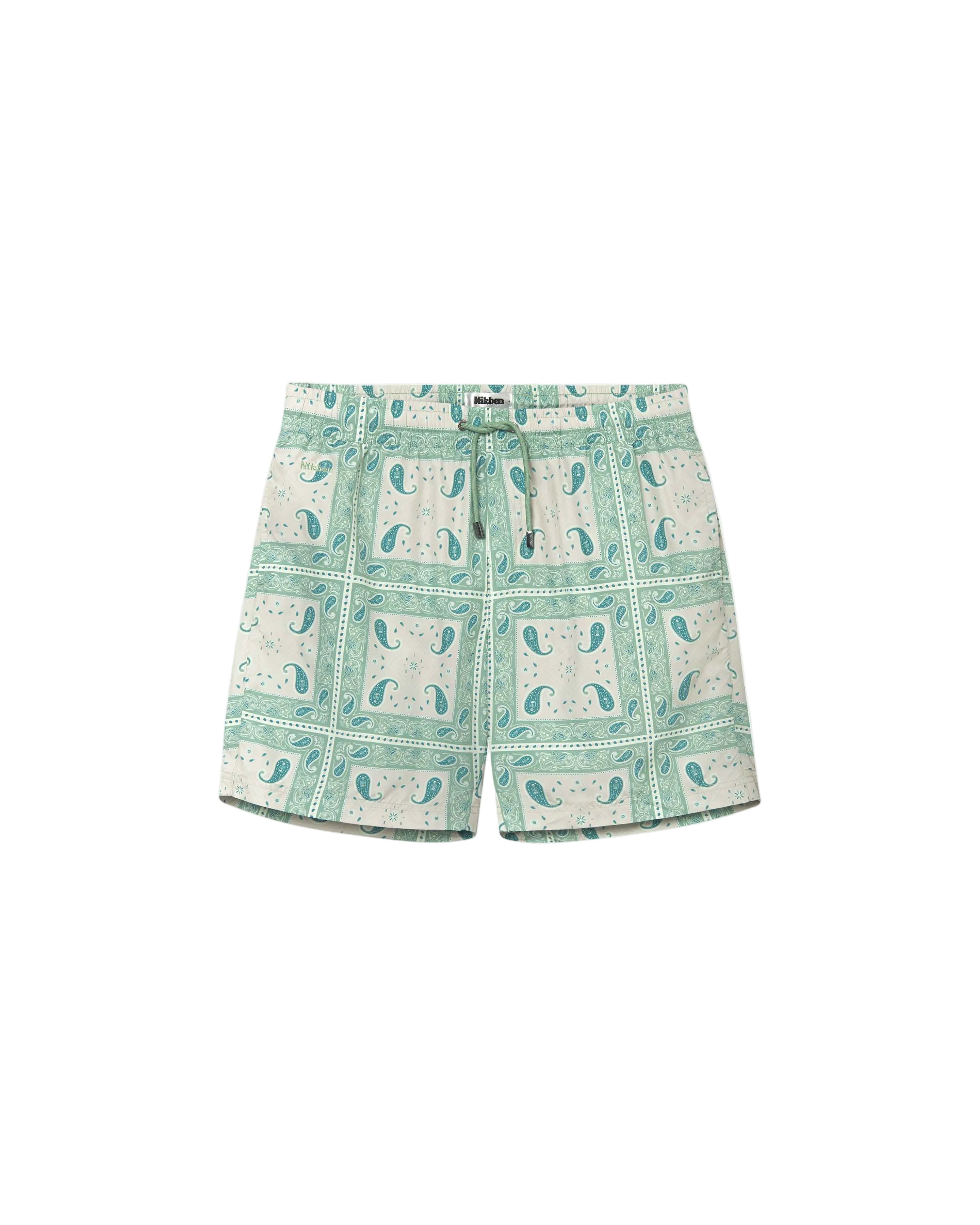A pair of green swim trunks with a paisley pattern, featuring side pockets and a zipper back pocket.