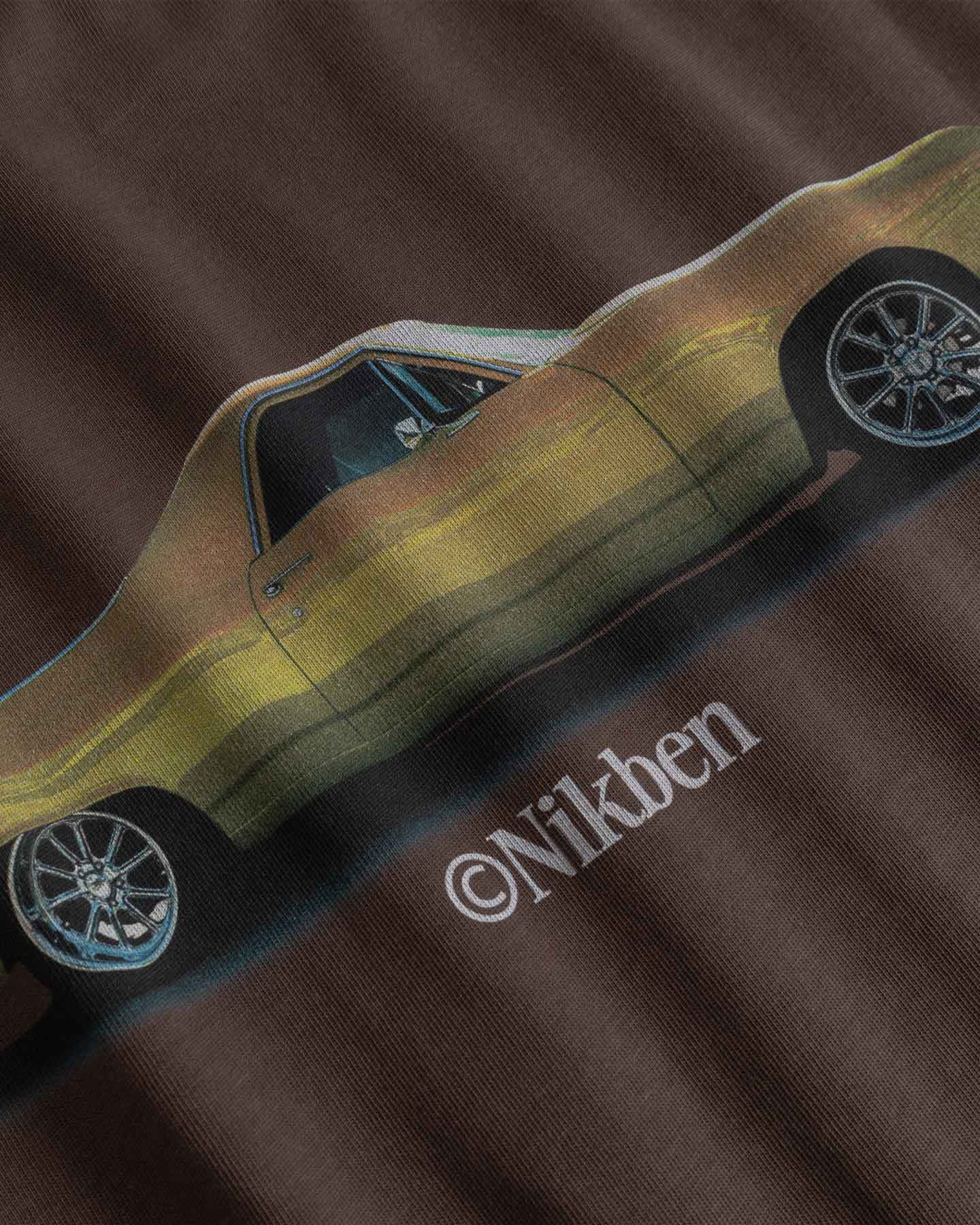Close-up of car design and 'Nikben' branding.