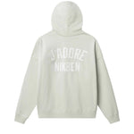 Light gray hoodie with 'Jaddore NikBen' text on the back against