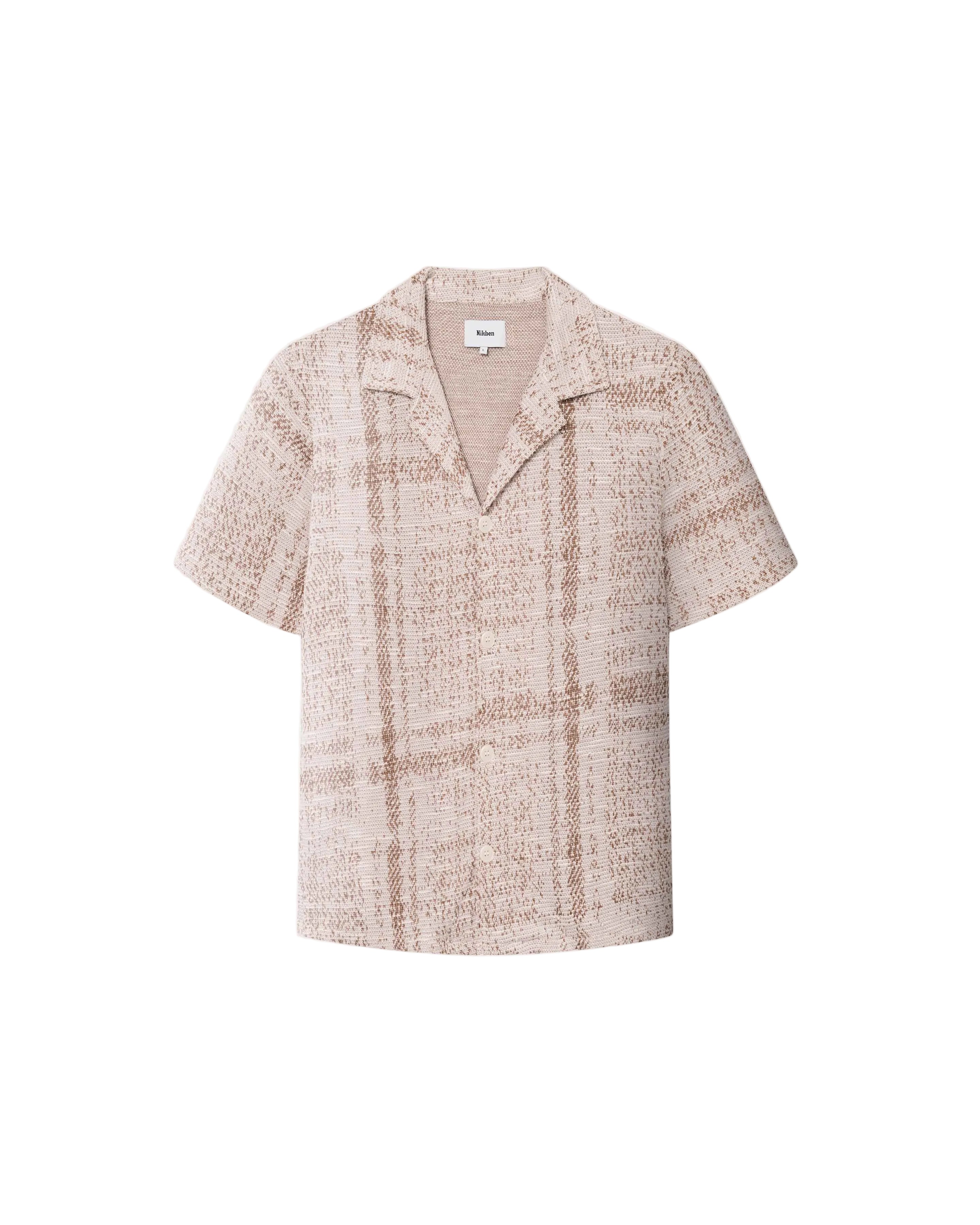 A beige Encinitas shirt with short sleeves and pearl buttons, displaying detailed jacquard stitching.