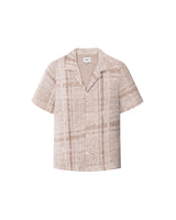 A beige Encinitas shirt with short sleeves and pearl buttons, displaying detailed jacquard stitching.