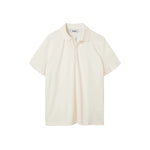 An off white, short-sleeved terry toweling shirt with pearl buttons and a collar.