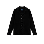 A long sleeve black terry towelling shirt with pearl buttons