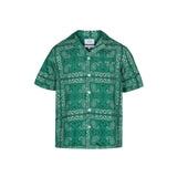 Green short sleeve vacation shirt with white pearl buttons