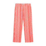 A pair of red Encinitas pants with fine jacquard stitching, displaying a full-length view.
