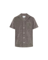 Dark grey short sleeve shirt with white button closure and one chest pocket