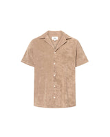 Light brown short sleeve shirt with white button closure and one chest pocket