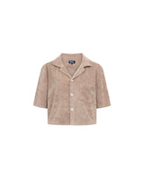 Light brown, short sleeve, cropped shirt with white button closure and one chest pocket