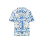 White short-sleeved vacation shirt with blue graphic pattern, open collar, one breast pocket, and button closure.