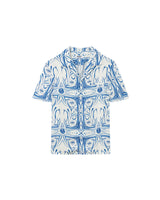 White short-sleeved vacation shirt with blue graphic pattern, open collar, one breast pocket, and button closure.