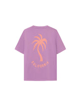 A grape colored t-shirt with a relaxed boxy cut and a palm tree graphic print on the front.