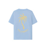A light blue t-shirt with a large palm tree graphic print on the back and a subtle chest print.