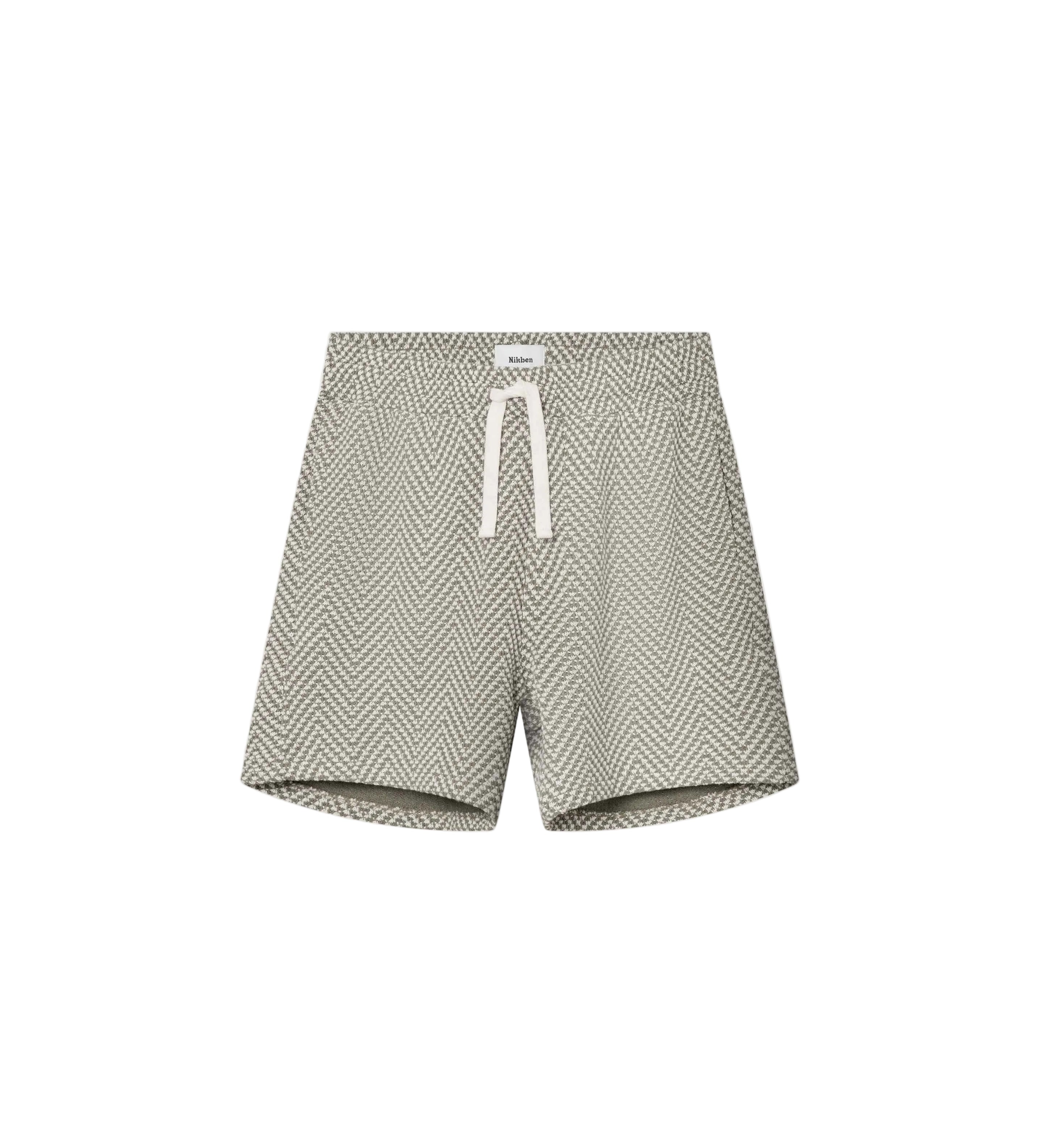 A pair of mid-length green jacquard shorts with a relaxed fit, featuring two side pockets and a back pocket, made from a polyester-cotton blend.