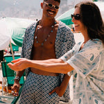 Female model wearing a Vintage pale yellow short sleeved shirt with paisley pattern