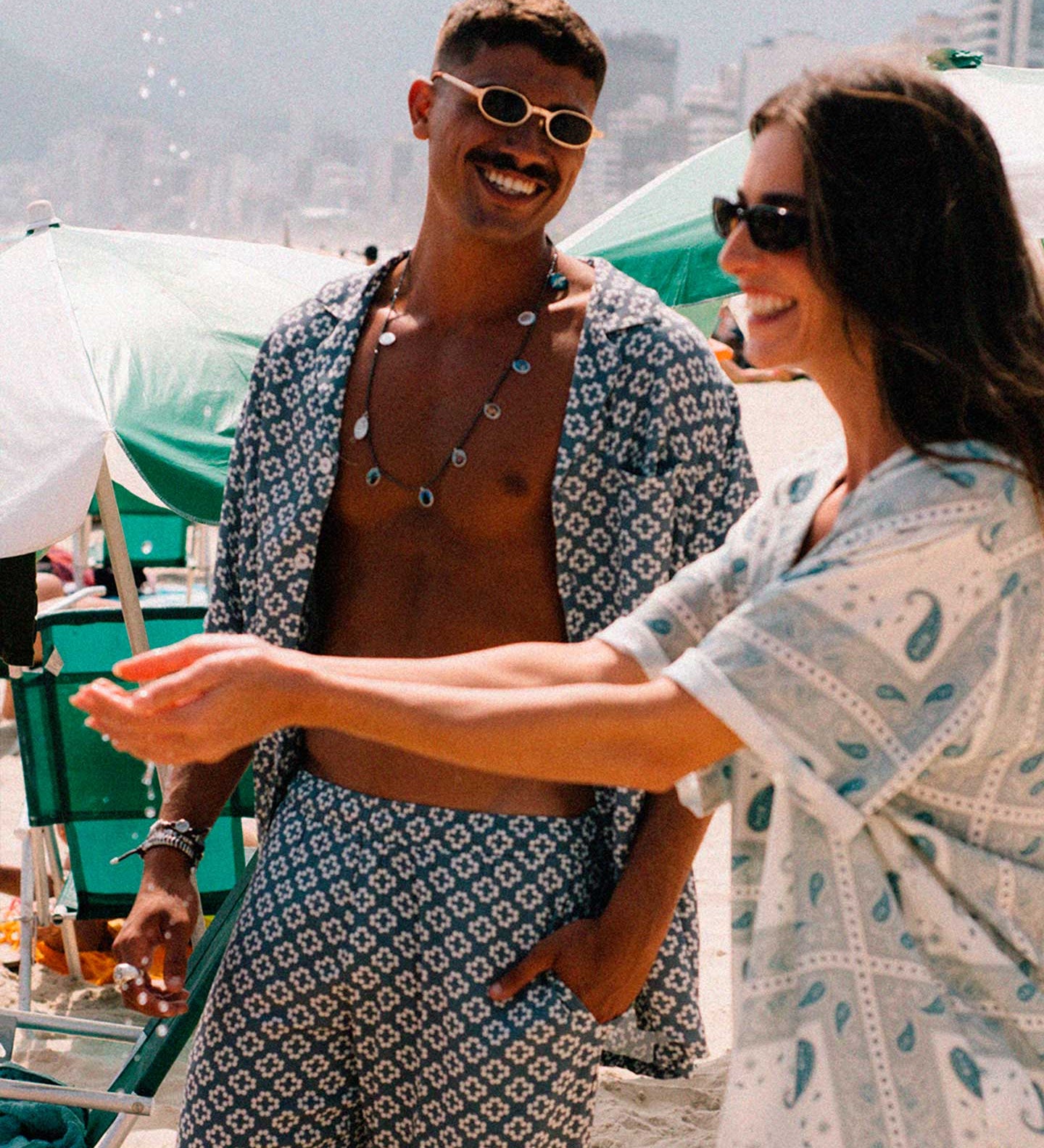 Female model wearing a Vintage pale yellow short sleeved shirt with paisley pattern