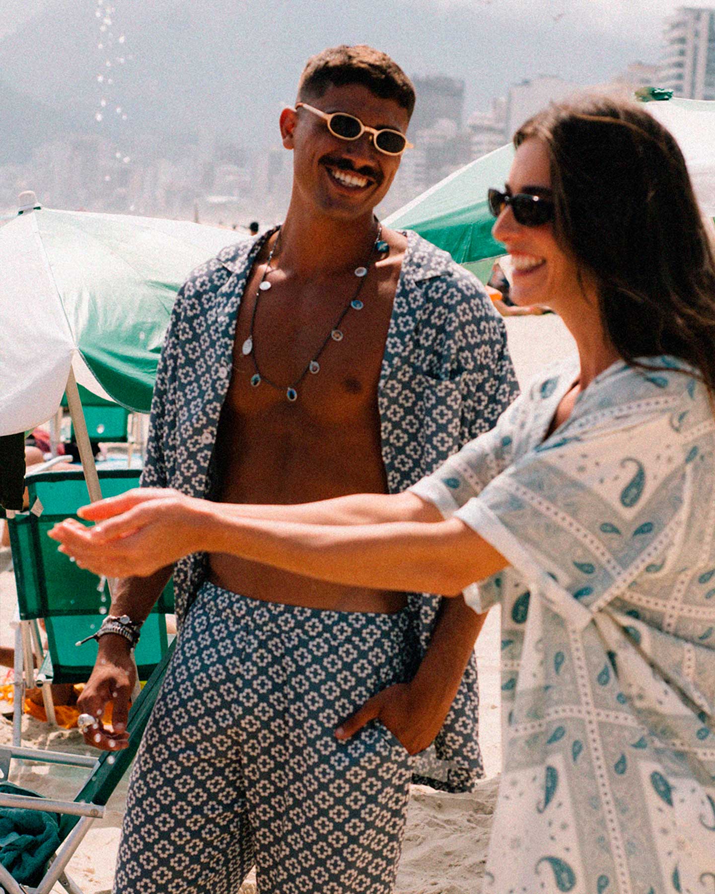 Female model wearing a Vintage pale yellow short sleeved shirt with paisley pattern