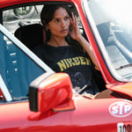 Female model wearing a black t-shirt with panther print.