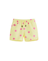 Yellow kids swim trunks with pink dots