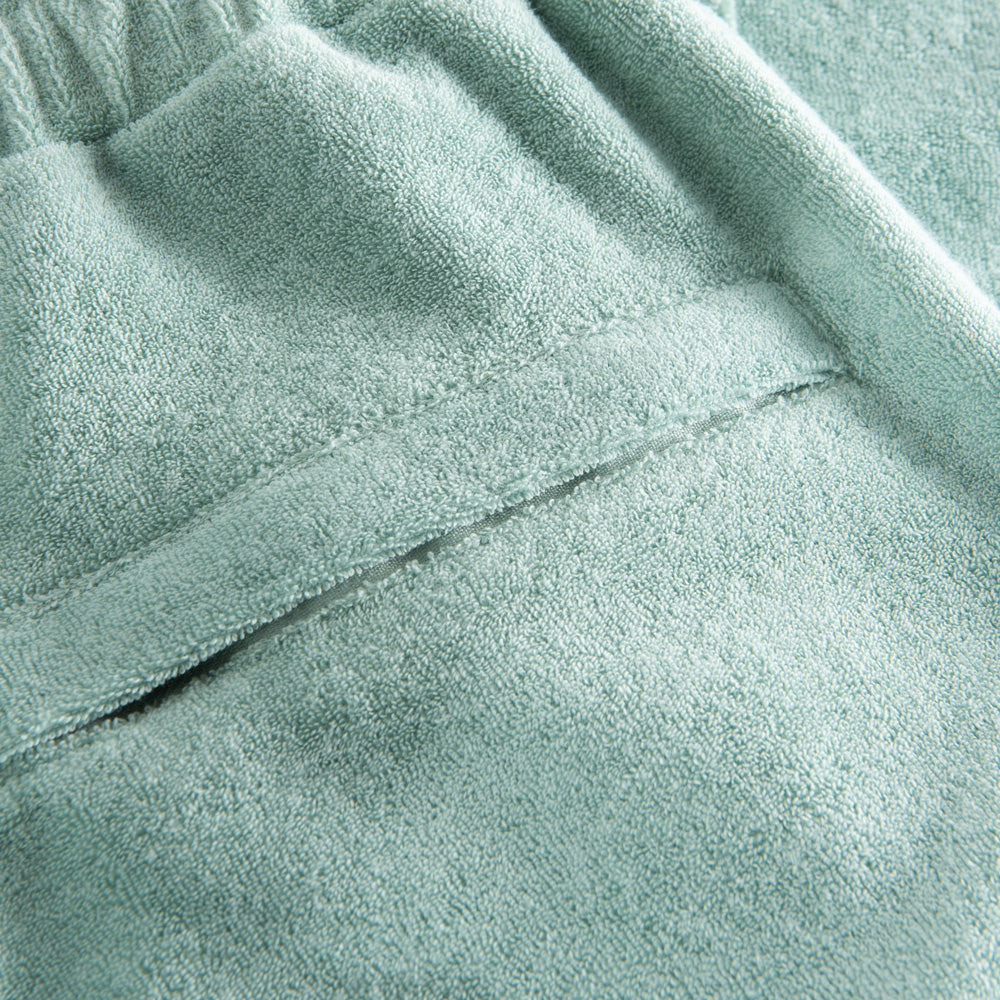 Back pocket on green Terry toweling pants