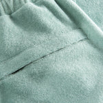 Back pocket on green Terry toweling pants