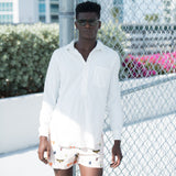 Model wearing off white long sleeve shirt
