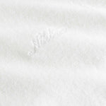 White "nikben" logo on a white hoodie
