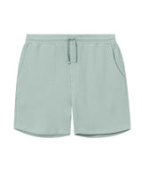 Mint green waffle-patterned mid-length shorts with two front pockets and a drawstring.